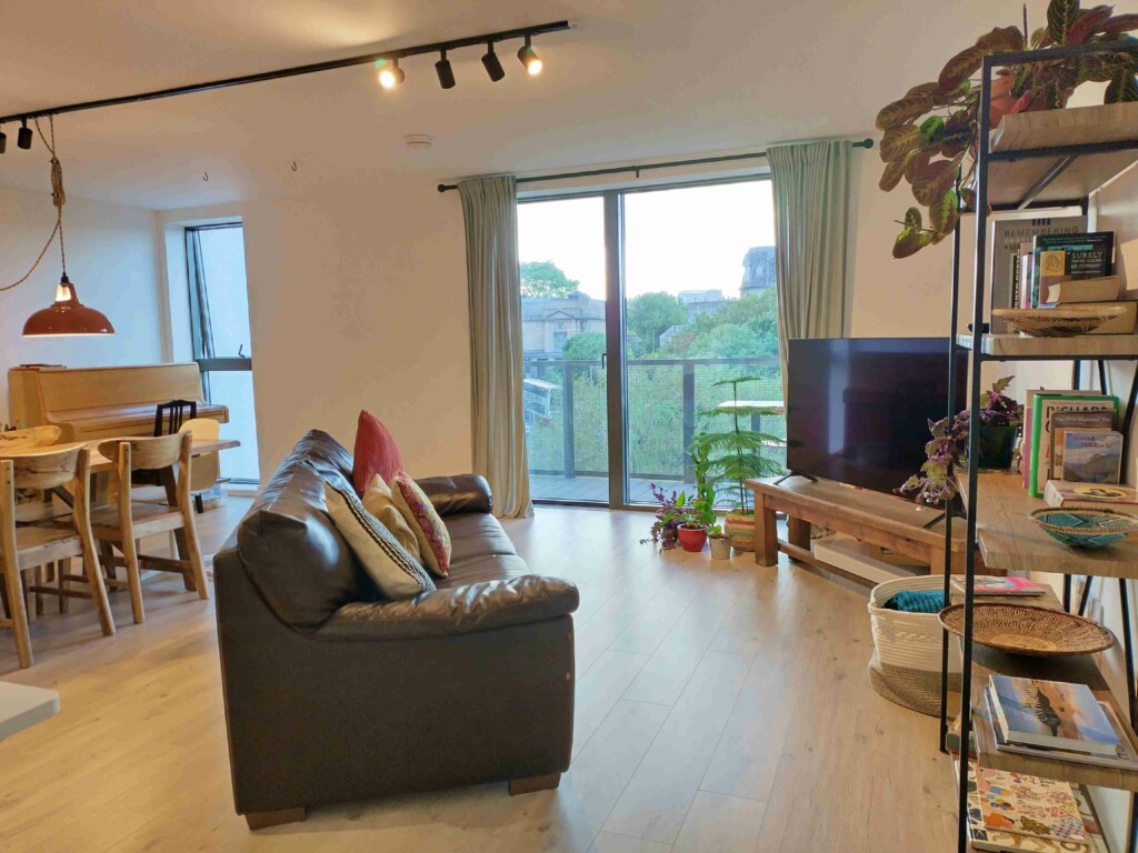 Living dining area looking out to balcony